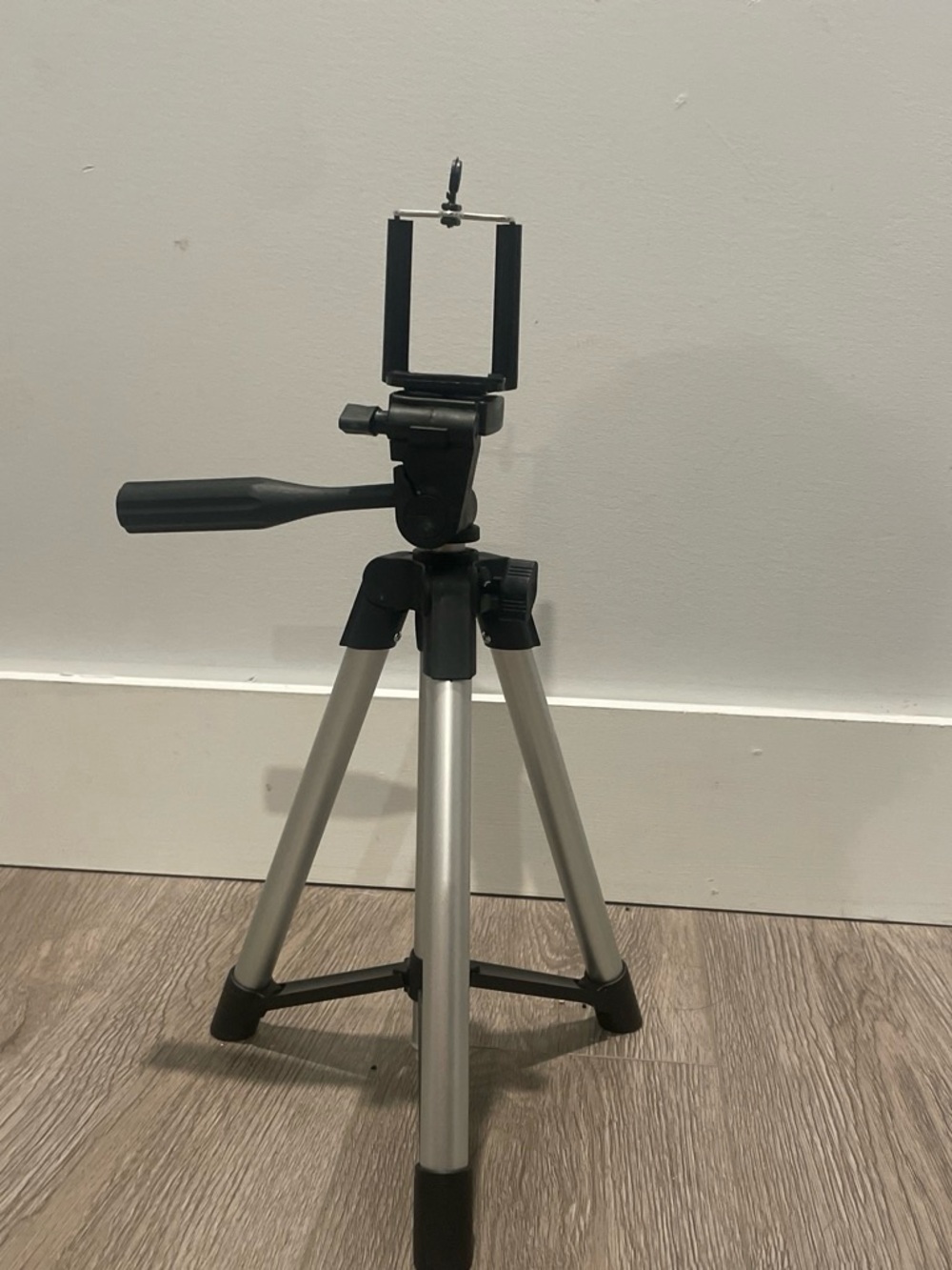 Portable Silver and Black Camera/Phone Tripod with Adjustable Mount